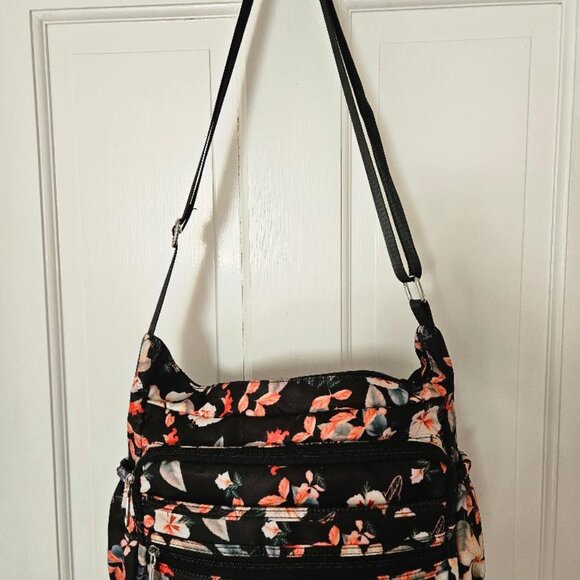 Black nylon w/ floral design shoulder bag w/ multiple pockets/compartments. - Picture 7 of 7